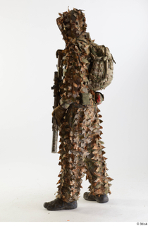 Frankie Perry Pose in Ghillie with Gun holding gun standing…